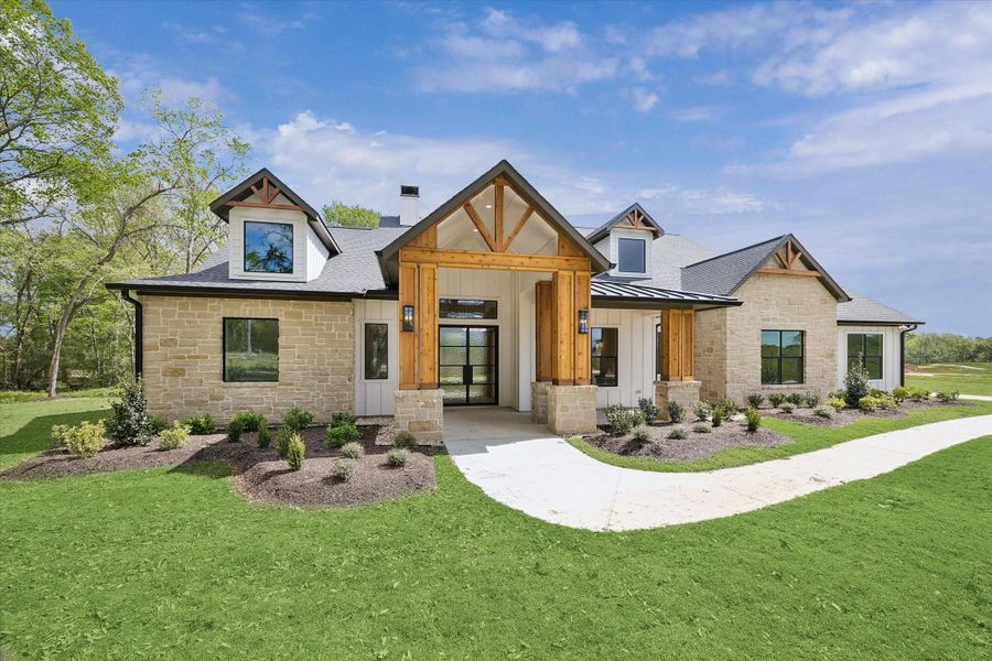 Front exterior of a new home in , Plantersville, TX, highlighting curb appeal (Image 25).