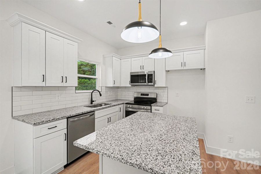 Furnished interior view inside a new home in , Charlotte (Image 6).