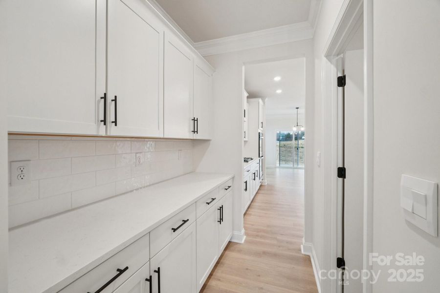 Furnished interior view inside a new home in Sylvan Creek, Denver (Image 3).