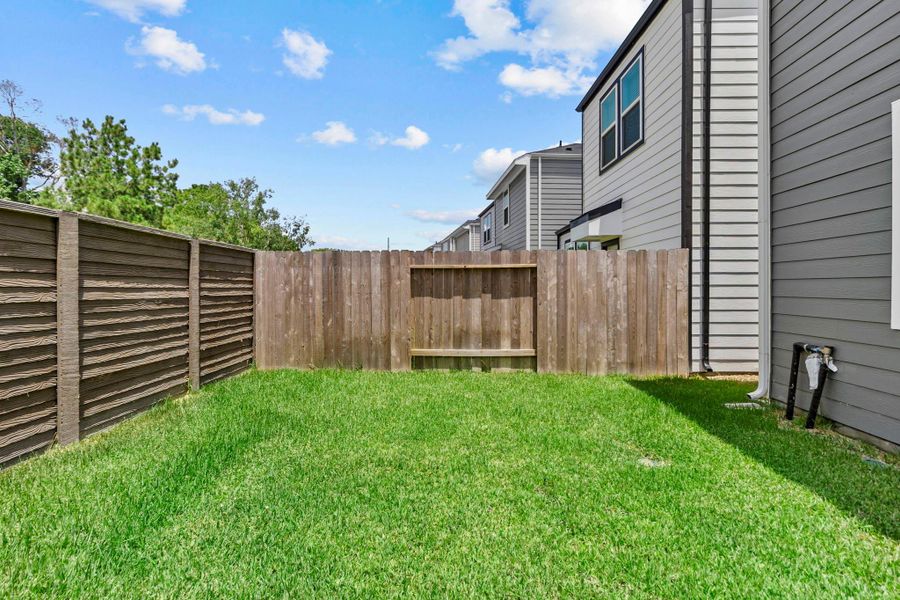 Exterior details and patio area of a home in , Houston (Image 4).