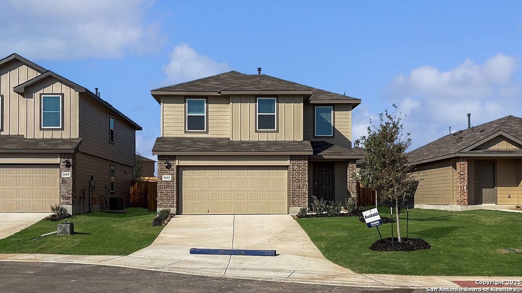 Front exterior of a new home in Langdon, San Antonio, TX, highlighting curb appeal (Image 26). Front exterior of a new home in Langdon, San Antonio, TX, highlighting curb appeal (Image 26).