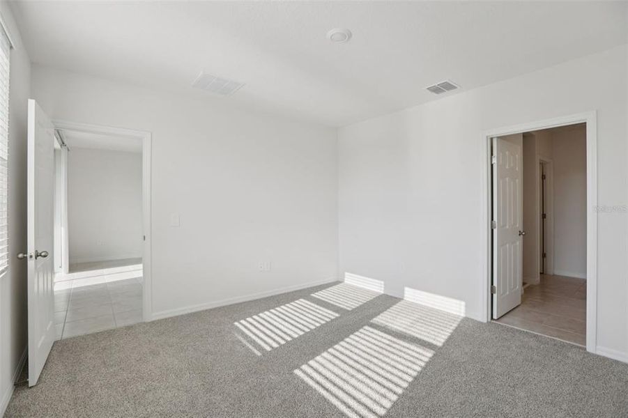 Spacious, unfurnished interior of a new home in Springs at Lake Alfred - Classic Series, Lake Alfred (Image 23).