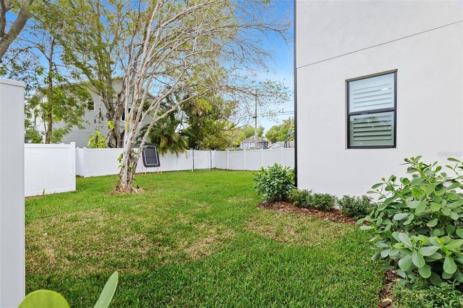 Exterior details and patio area of a home in , Tampa (Image 40).