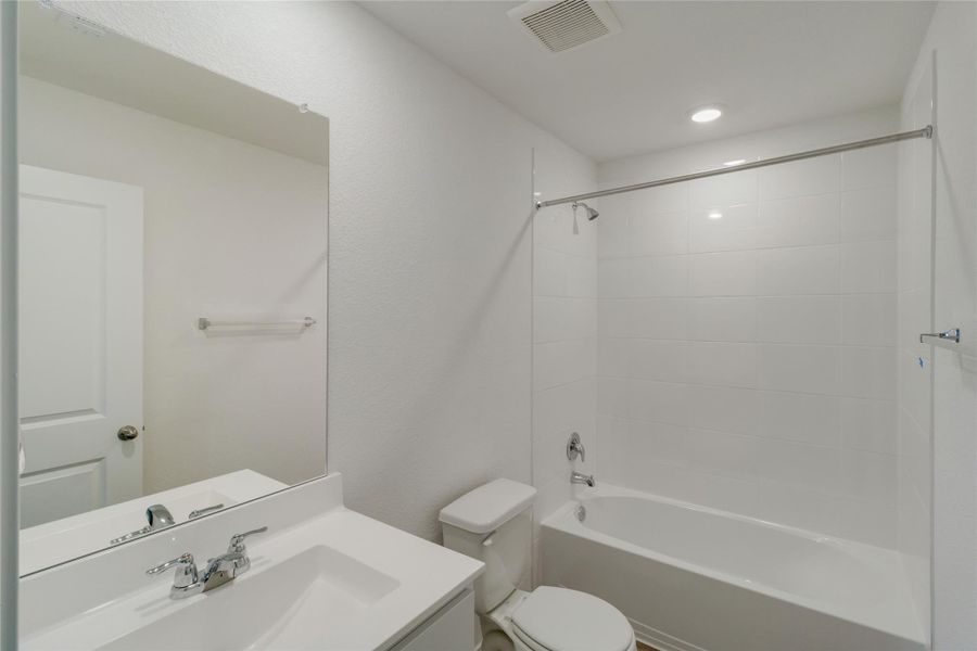 Furnished interior view inside a new home in Prairie Lakes, Buda (Image 7).