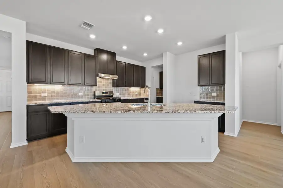 Furnished interior view inside a new home in Salerno - Classic Collection, Round Rock (Image 6). Furnished interior view inside a new home in Salerno - Classic Collection, Round Rock (Image 6).