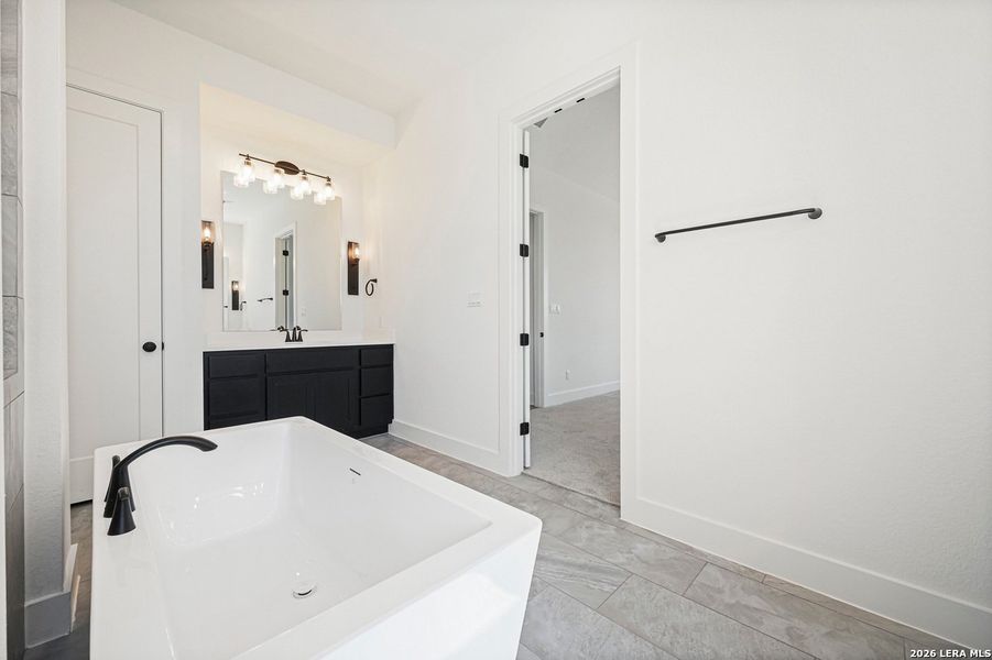 Furnished interior view inside a new home in La Cima, San Marcos (Image 13).