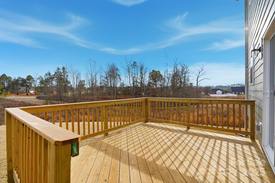 Deck overlooking backyard