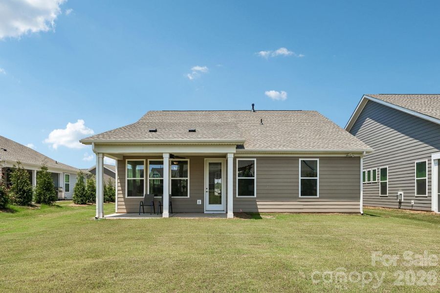 Exterior details and patio area of a home in , Charlotte (Image 24).