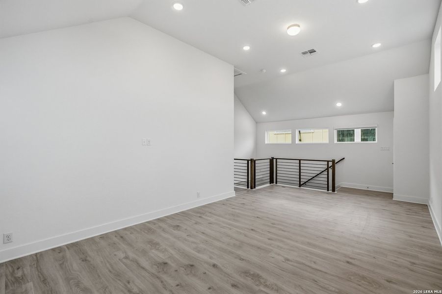 Spacious, unfurnished interior of a new home in Prominence, San Antonio (Image 28).