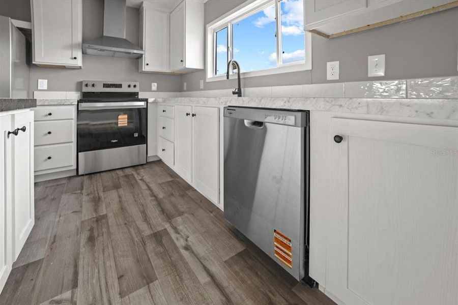 Furnished interior view inside a new home in , Okeechobee (Image 8).
