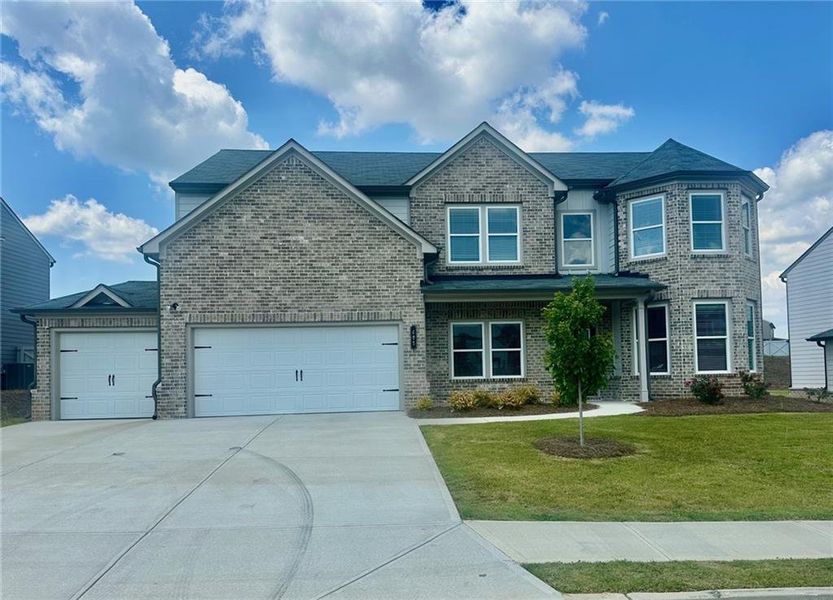 Front exterior of a new home in , Auburn, GA, highlighting curb appeal (Image 23).