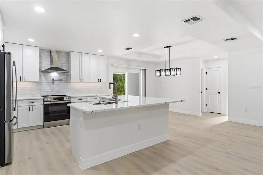 Furnished interior view inside a new home in , Weeki Wachee (Image 10).