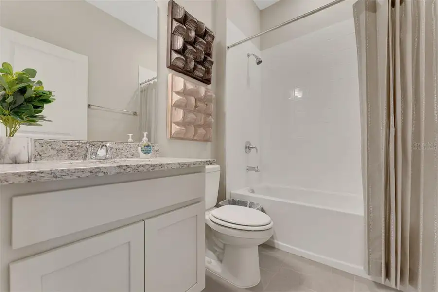 Furnished interior view inside a new home in Willowbrook North, Winter Haven (Image 28).