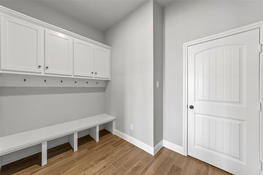 Mudroom featuring light hardwood / wood-style floors