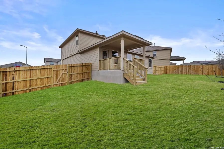 Exterior details and patio area of a home in Redbird Ranch, San Antonio (Image 3).