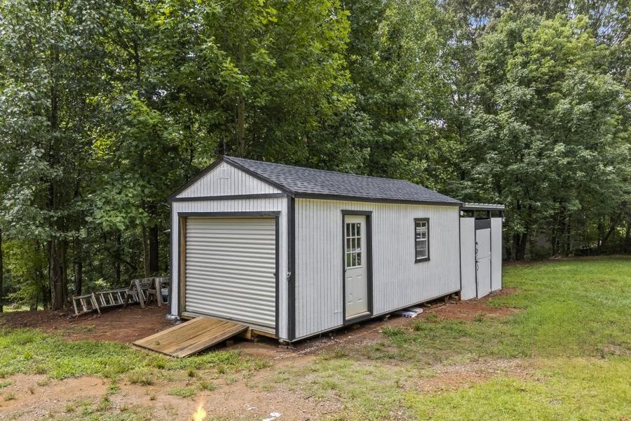 Front exterior of a new home in , Dawsonville, GA, highlighting curb appeal (Image 23). Front exterior of a new home in , Dawsonville, GA, highlighting curb appeal (Image 23).
