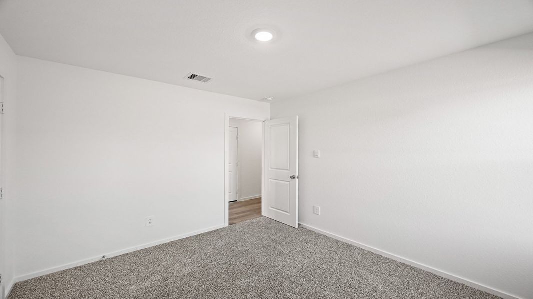 Representative unfurnished interior of a home built from the Anderson by D.R. Horton in Lexington Heights, Willis (Image 15). Representative unfurnished interior of a home built from the Anderson by D.R. Horton in Lexington Heights, Willis (Image 15).