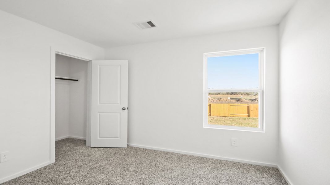 Spacious, unfurnished interior of a new home in Lexington Heights, Willis (Image 21).