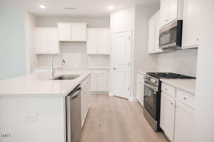 Furnished interior view inside a new home in Gregory Village, Lillington (Image 77).