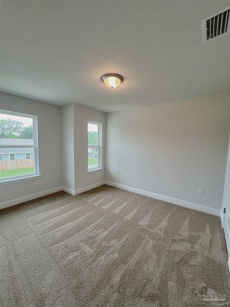 Spacious, unfurnished interior of a new home in Pine Top, Cantonment (Image 13).