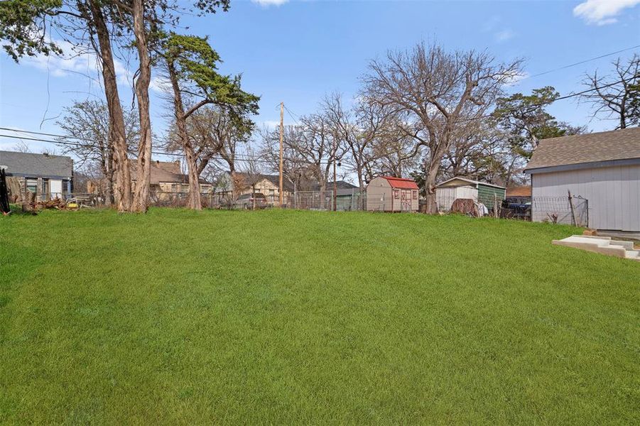 View of yard with an outdoor structure View of yard with an outdoor structure