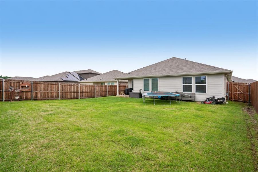 Exterior details and patio area of a home in Frontier Pointe, Princeton (Image 25).