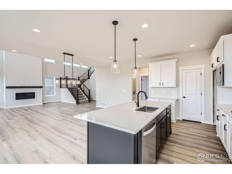 Furnished interior view inside a new home in RainDance, Windsor (Image 12).