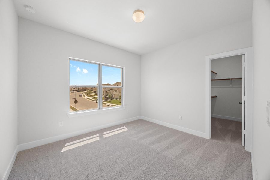 Spacious, unfurnished interior of a new home in Santa Rita Ranch - 60', Liberty Hill (Image 12). Spacious, unfurnished interior of a new home in Santa Rita Ranch - 60', Liberty Hill (Image 12).