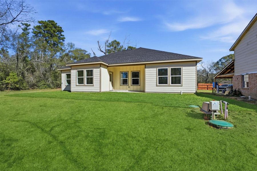 Exterior details and patio area of a home in , Conroe (Image 16). Exterior details and patio area of a home in , Conroe (Image 16).