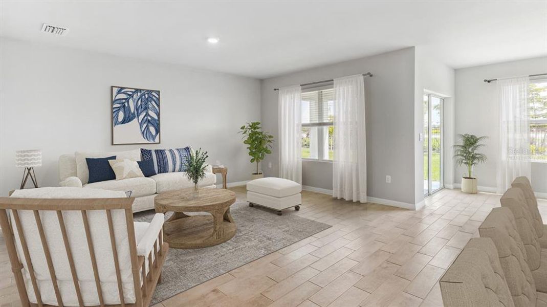 Furnished interior view inside a new home in Seagrass - Express & Tradition, Punta Gorda (Image 3). Furnished interior view inside a new home in Seagrass - Express & Tradition, Punta Gorda (Image 3).