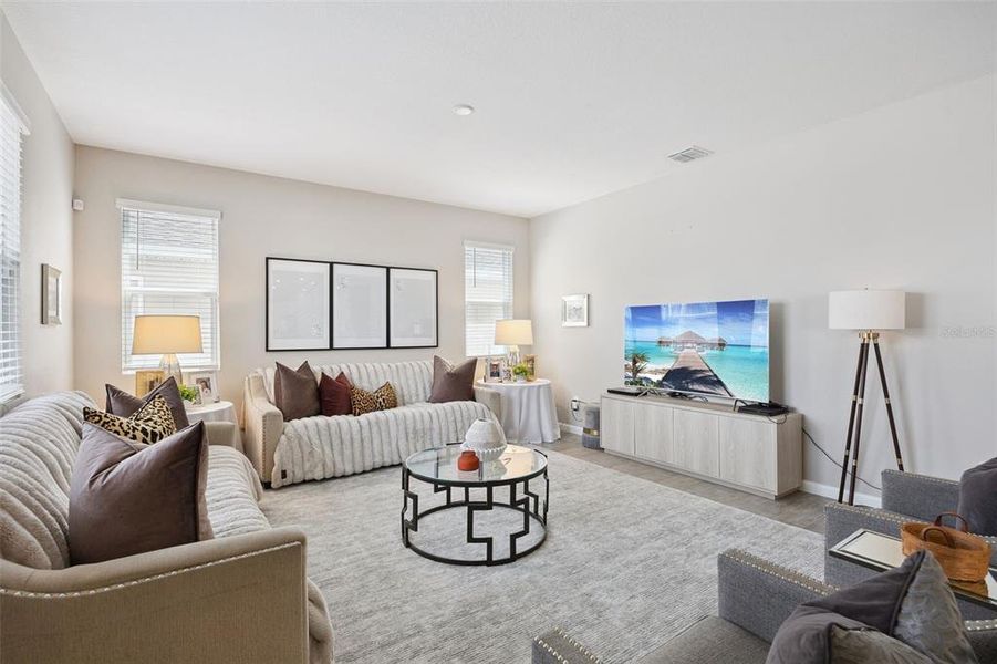 Furnished interior view inside a new home in Seasons at The Grove, Mascotte (Image 26).
