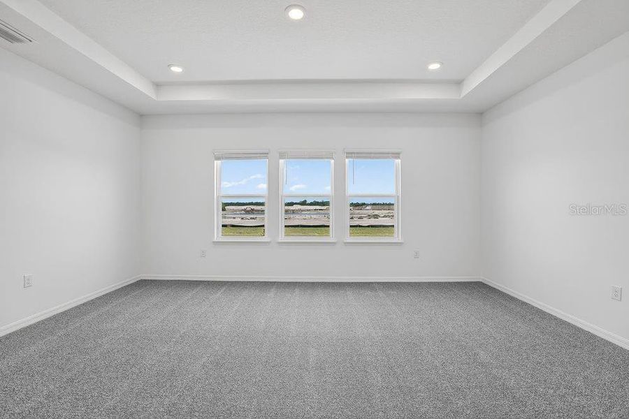 Spacious, unfurnished interior of a new home in Ardisia Park, New Smyrna Beach (Image 24).