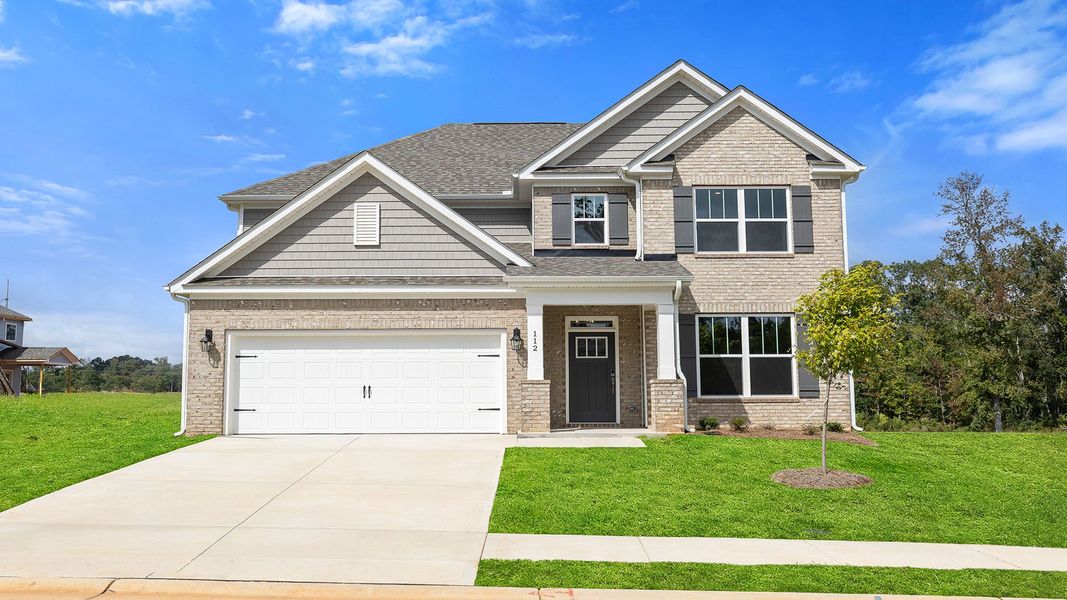 Front exterior of a new home in Harrison Valley, Simpsonville, SC, highlighting curb appeal (Image 1). Front exterior of a new home in Harrison Valley, Simpsonville, SC, highlighting curb appeal (Image 1).