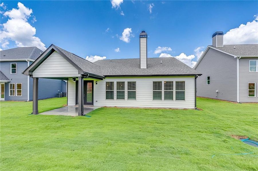 Exterior details and patio area of a home in , Homer (Image 18). Exterior details and patio area of a home in , Homer (Image 18).