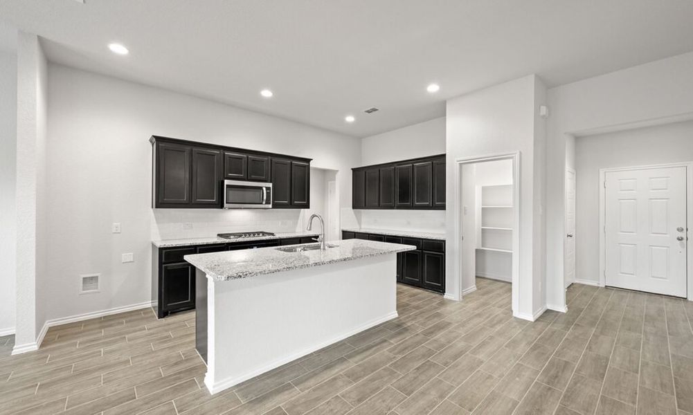 Representative exterior photo of a completed home built from the Alderbury II by Impression Homes in Stone Eagle, Azle, TX (Image 7). Representative exterior photo of a completed home built from the Alderbury II by Impression Homes in Stone Eagle, Azle, TX (Image 7).