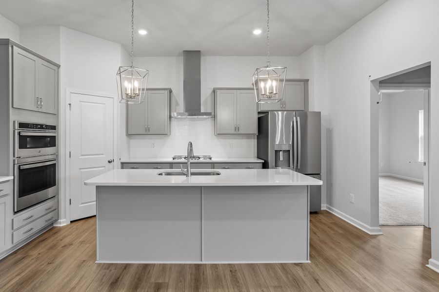 Furnished interior view inside a new home in Ovation at Sweetbrier, Durham (Image 8).