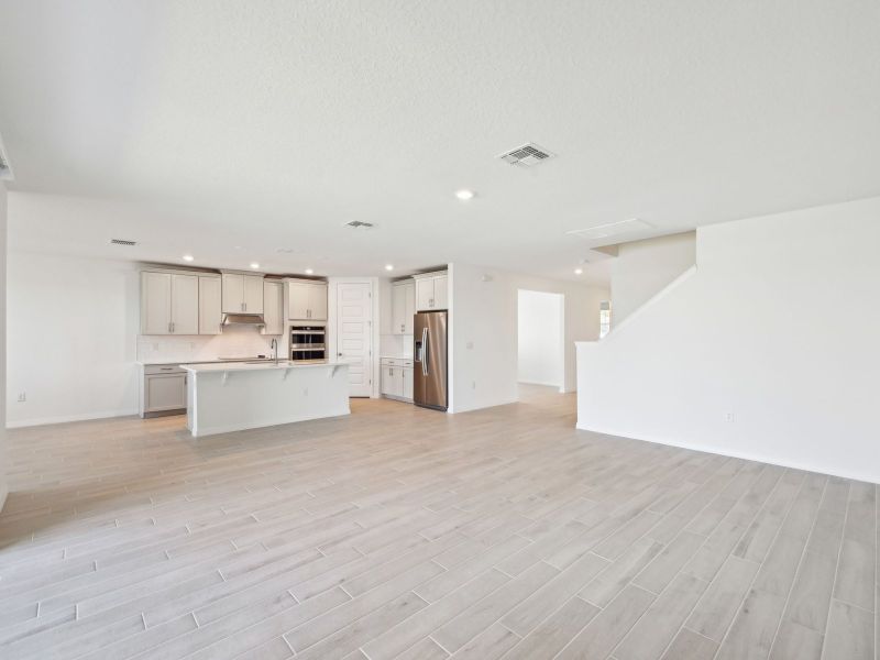 Spacious, unfurnished interior of a new home in Oakfield Trails - Signature Series, Parrish (Image 6).