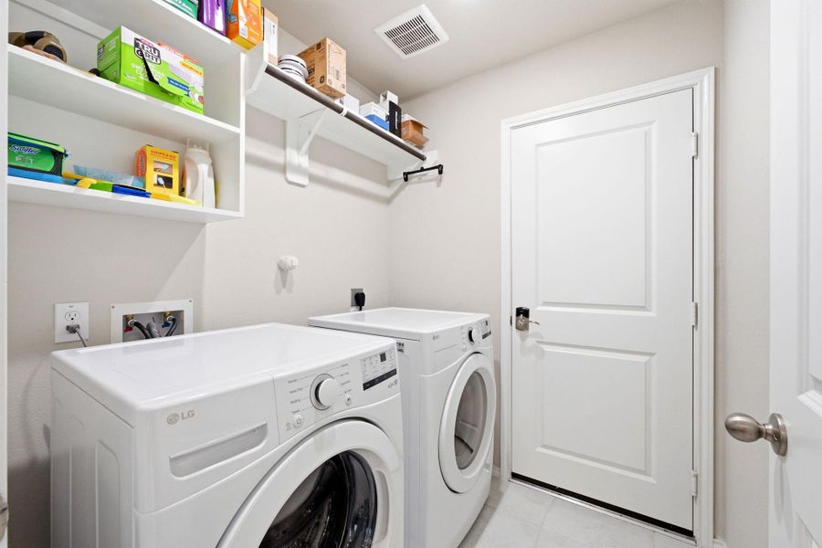 Laundry room and easy access to the garage.