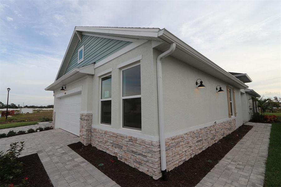 Exterior details and patio area of a home in Gracewater at Sarasota, Sarasota (Image 20).