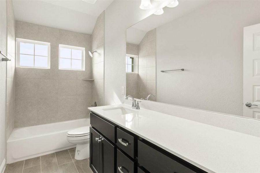 Representative furnished interior of a home built from the Clear Creek 1668 by Brohn Homes in Clear Creek, Round Rock (Image 9).