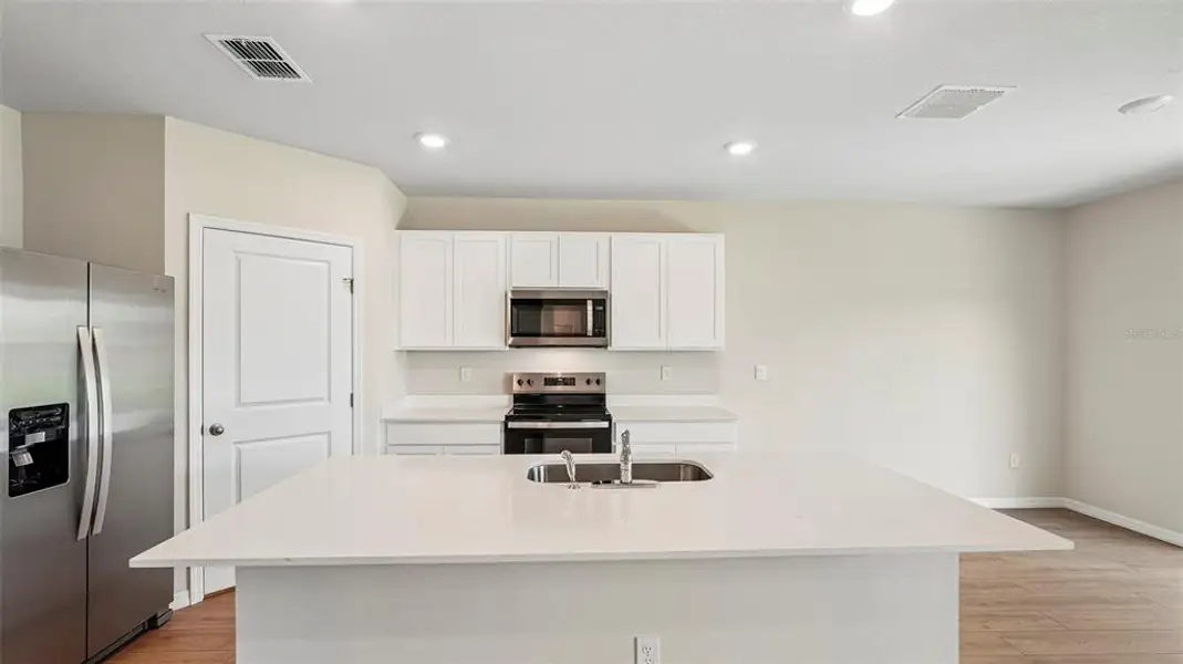 Furnished interior view inside a new home in Oakfield Trails, Parrish (Image 6). Furnished interior view inside a new home in Oakfield Trails, Parrish (Image 6).