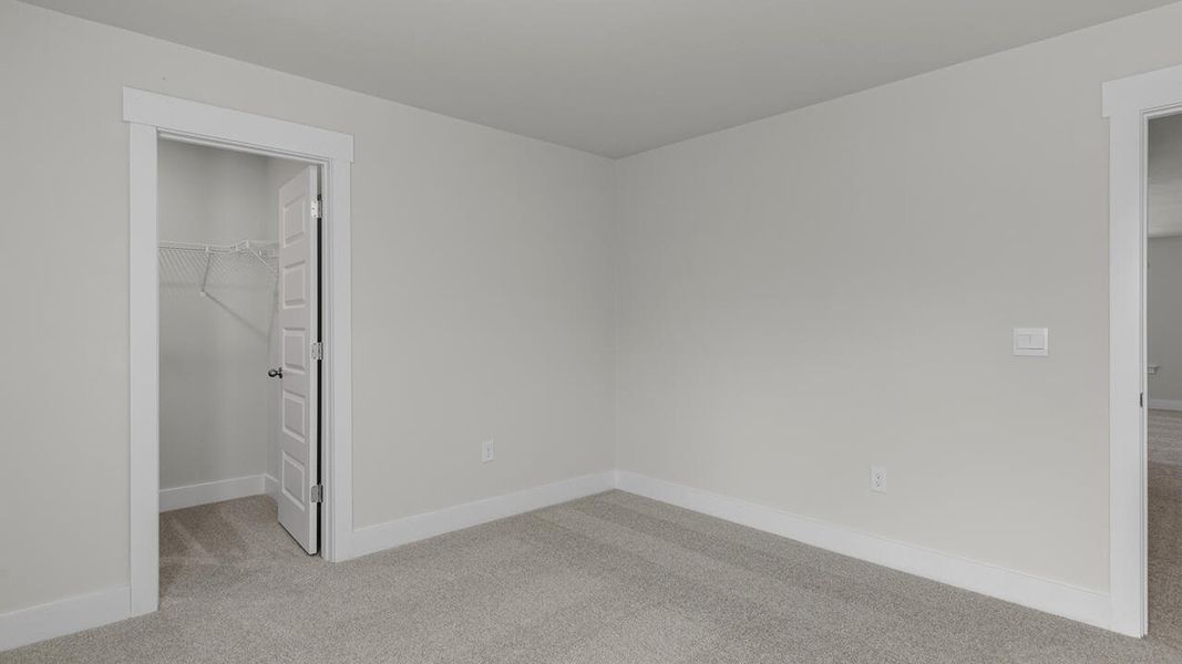 Spacious, unfurnished interior of a new home in Surfside Landing, Hubert (Image 37).
