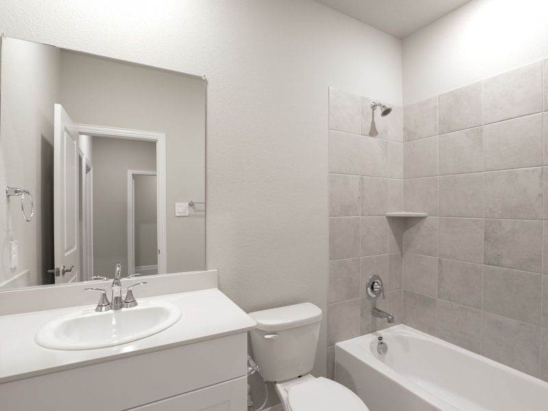 Furnished interior view inside a new home in Parks at Foster Crossing - Premier Series, Anna (Image 9).