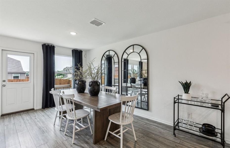 *Model Representation - Dining nook off kitchen with large windows *Model Representation - Dining nook off kitchen with large windows
