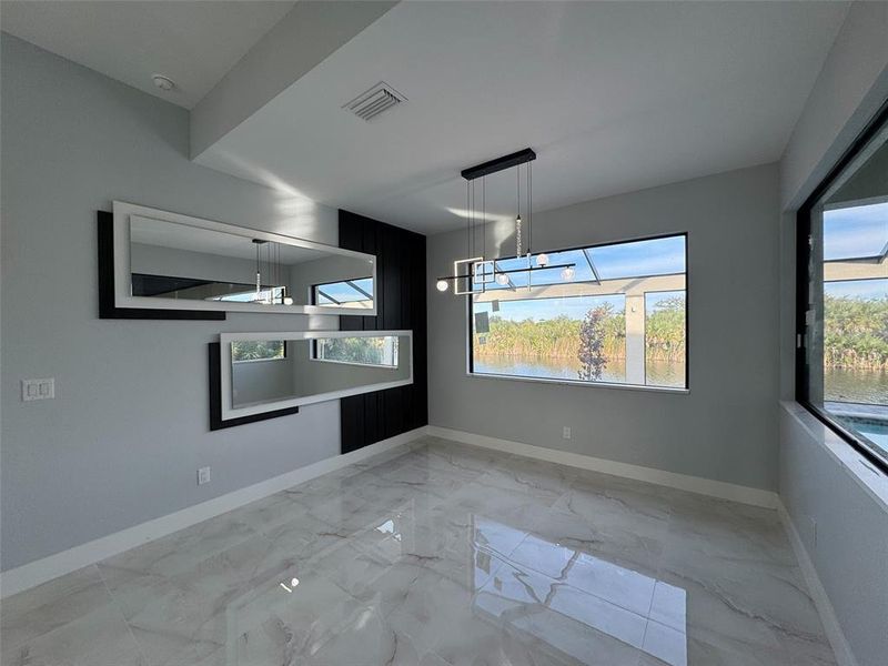 Spacious, unfurnished interior of a new home in , Port Charlotte (Image 26).