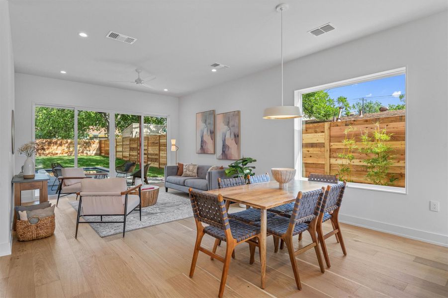 Situated between the kitchen andliving room, the dining areaeffortlessly links both spaces. Situated between the kitchen andliving room, the dining areaeffortlessly links both spaces.