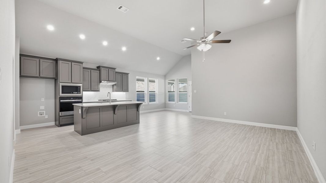 Representative furnished interior of a home built from the BASSWOOD by D.R. Horton in Treeline, Justin (Image 8).