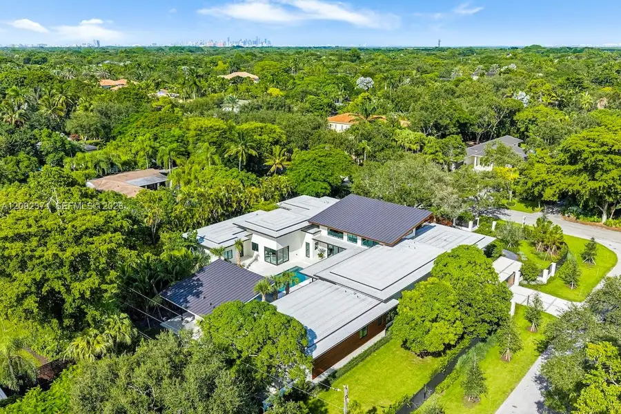 Front exterior of a new home in , Pinecrest, FL, highlighting curb appeal (Image 21).