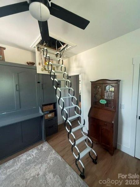 Custom attic staircase to attic storage in second bedroom main floor Custom attic staircase to attic storage in second bedroom main floor