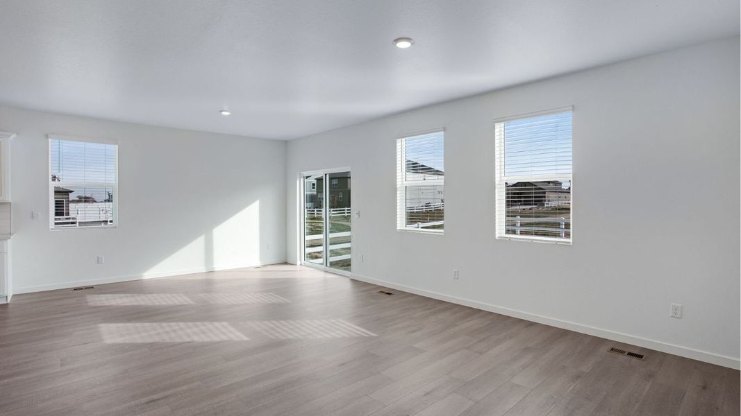 Representative unfurnished interior of a home built from the Newcastle by D.R. Horton in Tailholt, Severance (Image 10).